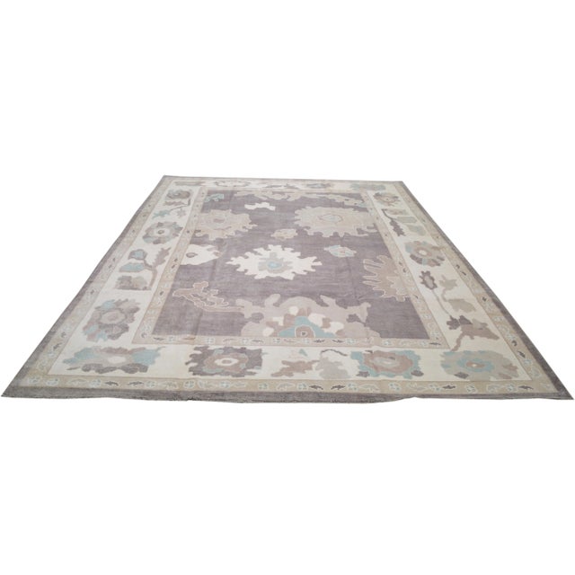 Turkish Oushak hand knotted rug with natural colors, contemporary style and soft texture.