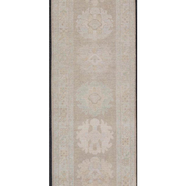 Tribal Long Soft Oushak Runner With Sand Field and Pale Green and Blue Accents For Sale - Image 3 of 12