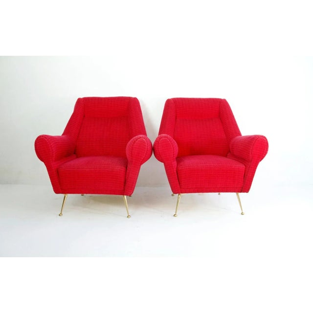 A pair of Italian armchairs designed by Gigi Radice for Minotti produced, circa 1950. The chairs haven’t been...