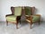Elegant pair of vintage Ethan Allen wingback Bergère lounge chairs featuring carved faux bamboo frames, woven cane panels,...