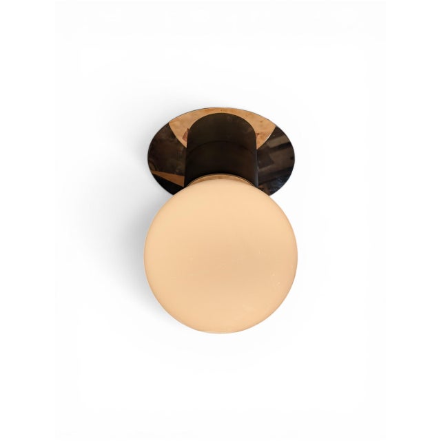 Brass Pipe Flushmount ceiling fixture in Antique Gilt finish by Urban Electric Co. from the Pipe collection. Opal glass,...