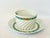 Vintage Haviland Limoges teacup and saucer set features a distinct "Calais Swirl" pattern in green and yellow fruits with...