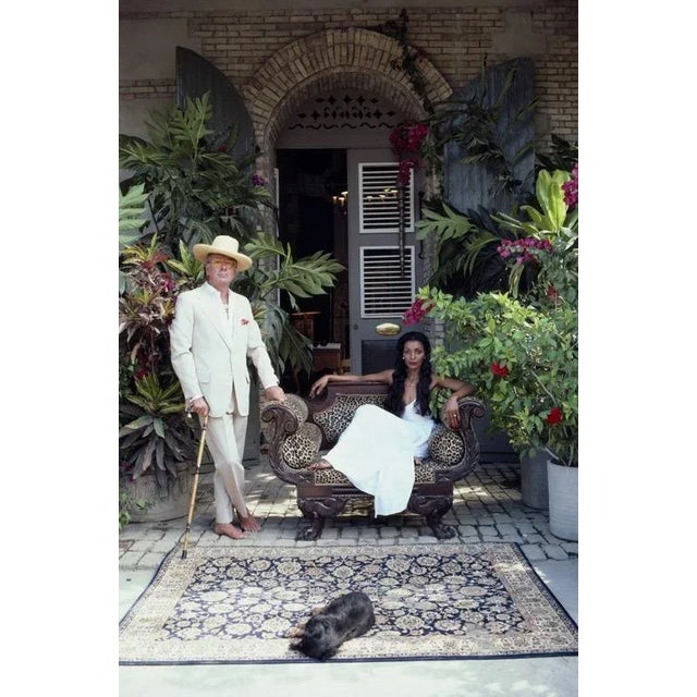 Olivier Coquelin 1981 Olivier Coquelin and Lahaina Kameha in Haiti, February 1981. (Photo by Slim Aarons) Slim Aarons was...