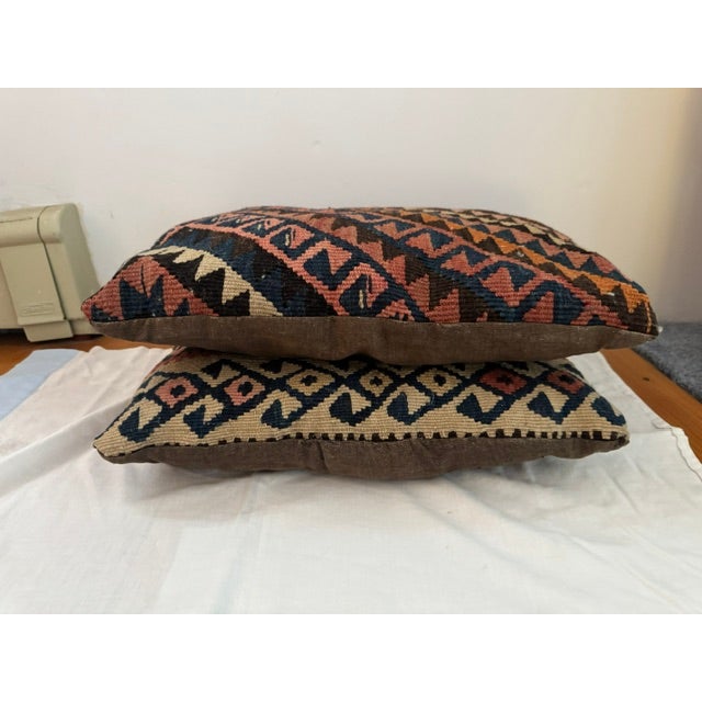 lovely pair of vintage Kilim pillows showing the artisans sensibilities reflected in the quality of their fabrication and...