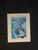 intage-style Puerto Rico wall art featuring a blue-toned aerial coastal city view. The piece shows an oceanfront cityscape...