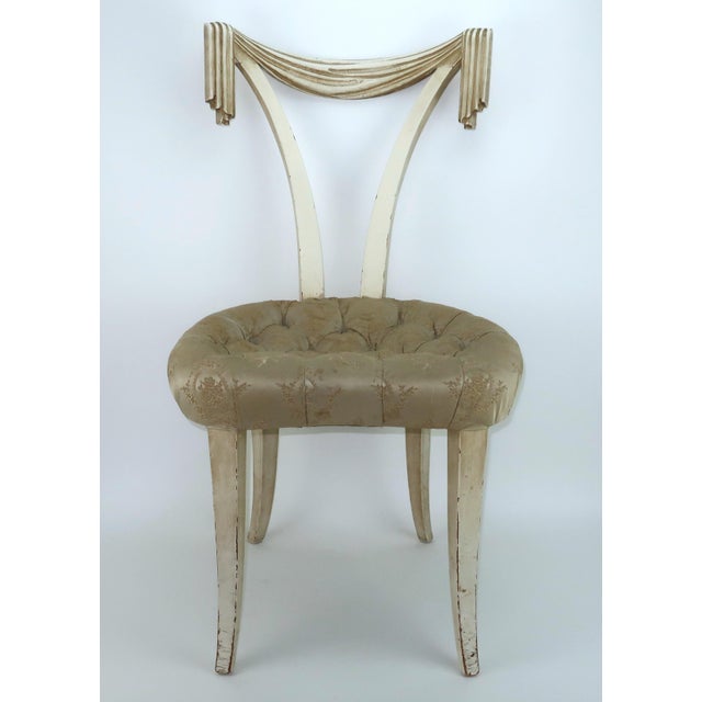 One look at this Grosfeld House chair conjures up images of old Hollywood glamour or New York high style of the 1940's....