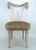 One look at this Grosfeld House chair conjures up images of old Hollywood glamour or New York high style of the 1940's....