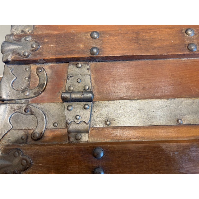 One of a kind Antique Trunk from France. Great Storage for pillows and blankets placed at the end of a bed.