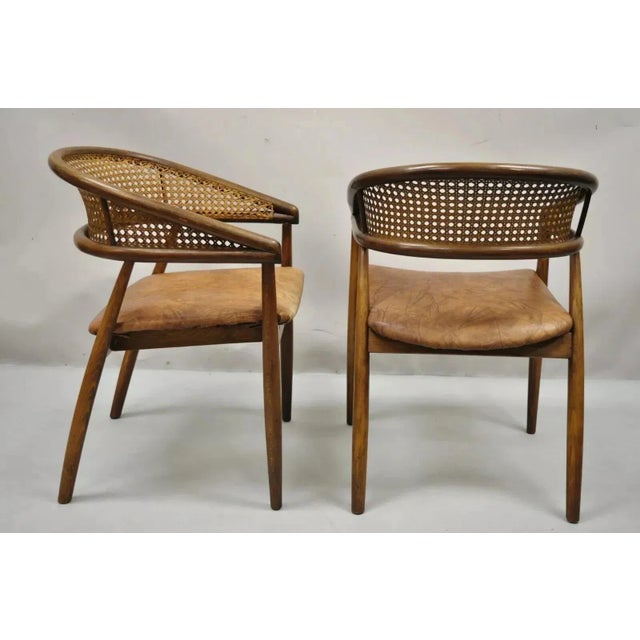 Vintage Mid Century Modern Cane "James Mont, King Cole" Style Bentwood Arm Chairs - a Pair. Item features cane barrel...
