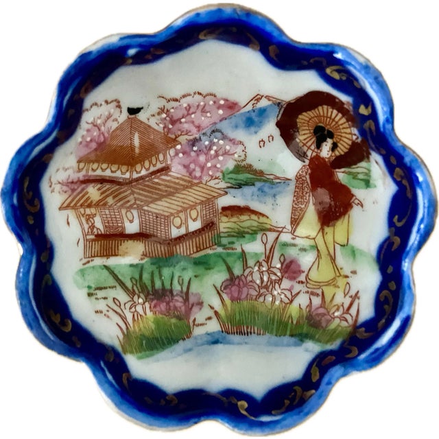 Offered is a stunning set of 23 pieces of plates and bowls made in Japan in the 1920's. These antique pieces are hand...