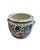 This fish motif planter is an artisan-crafted porcelain container designed to bring timeless grandeur to you home. Hand...