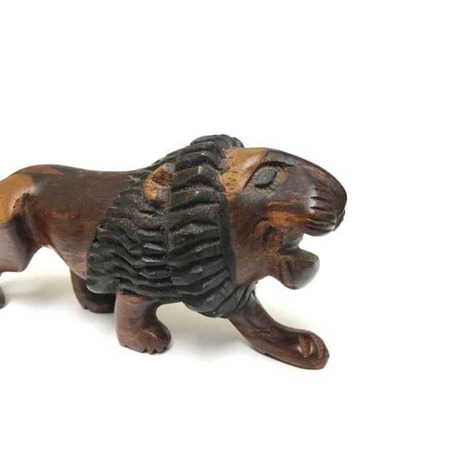 Hand Carved Wooden Lion Statue Item Details: -Hand made -Made of Wood -In Excellent Condition -It is (approximately): 7.5"...