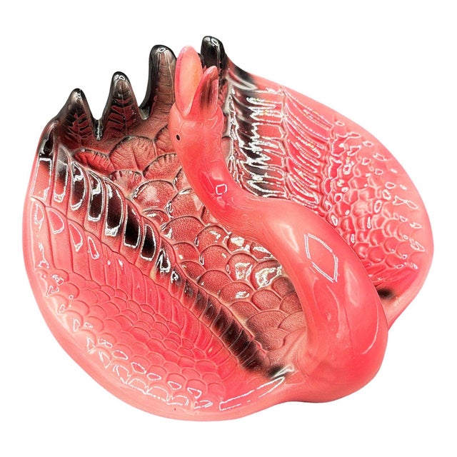 Mid-century style pink and green ceramic ashtray with a drinking flamingo by Sarsaparilla. The ashtray features a...