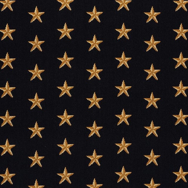 Hardwearing epingle velvet reprises an evergreen star motif reminiscent of needlepoint. Chameleon-like, it can embody a...