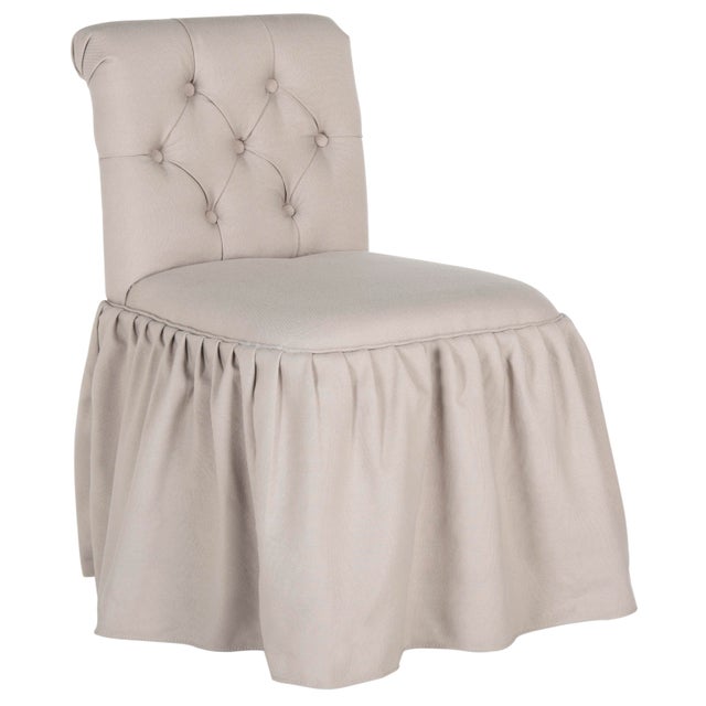 The ultimate luxury, this designer vanity chair is upholstered in taupe linen fabric with all the touches of a custom...