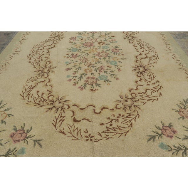 This 10x14 antique hooked rug is an elegant new addition to Rug & Kilim’s Antique collection—a rare and fascinating folk-...