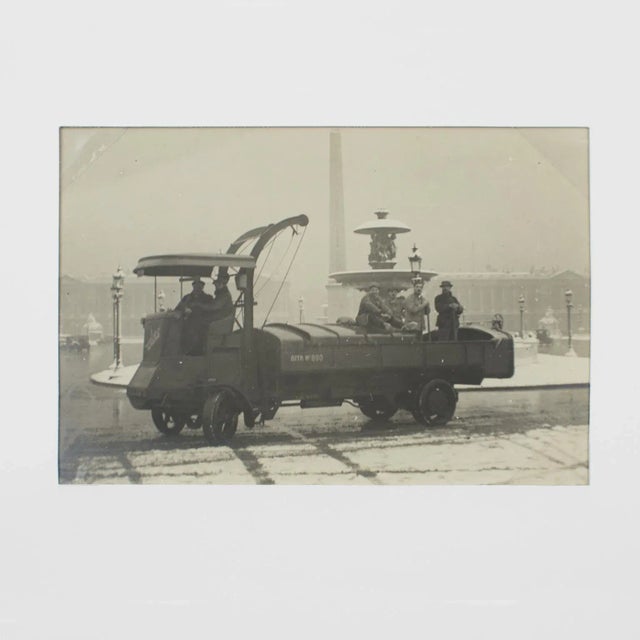 A unique original silver gelatin black and white photography, Paris, a salt truck on Place de la Concorde under the snow,...