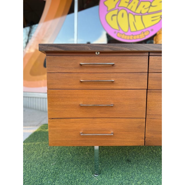 beautiful walnut throughout with laminate top (finished on all sides) versatile piece- could be used in the bedroom,...