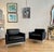 Pair of stunning black leather Nicos Zogrophos club chairs. Nicos Zographos made his name during his time at the renown...
