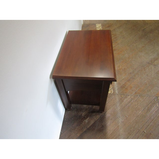 Item 86663: Ethan Allen solid cherry nightstand. Age: 2000's Details: Dovetailed drawer. Condition: Very clean excellent...