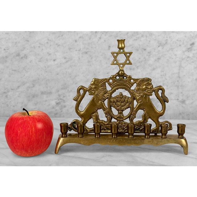 An Original 1970's European Brass Menorah Heavily Detailed Lions of Judah Motif, Topped with a Star of David Holds 9...