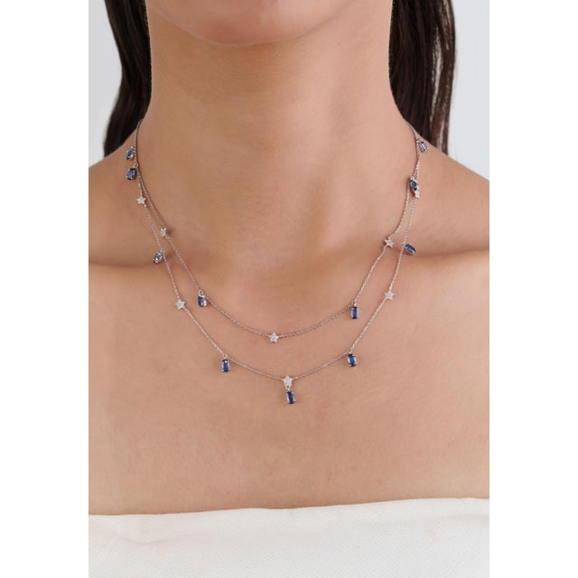 This Celestial Double Layer Star Station Necklace Featuring 2.84 ct of natural sapphires, set in 14K white gold. Each...