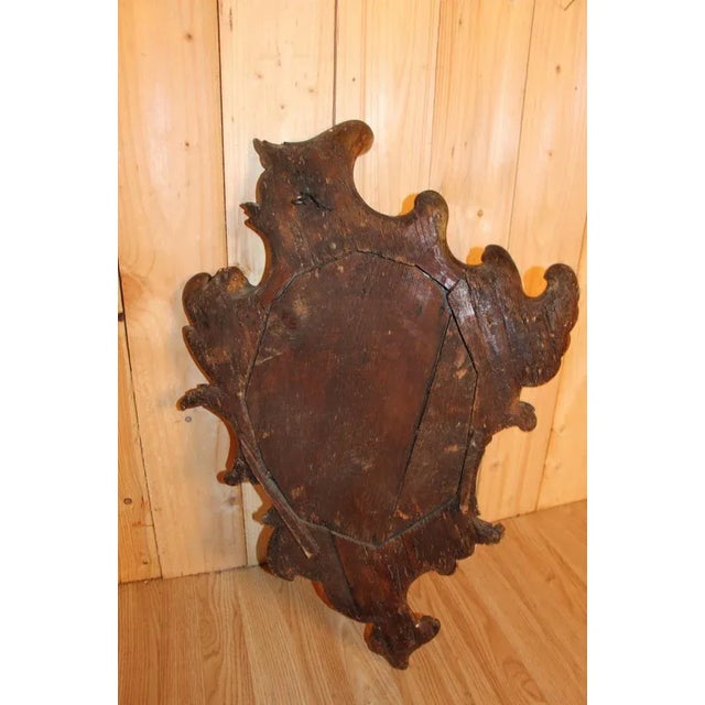 Italian mirror, rococo style late eighth 10th century early nineteenth in golden wood, very good condition The complexion...