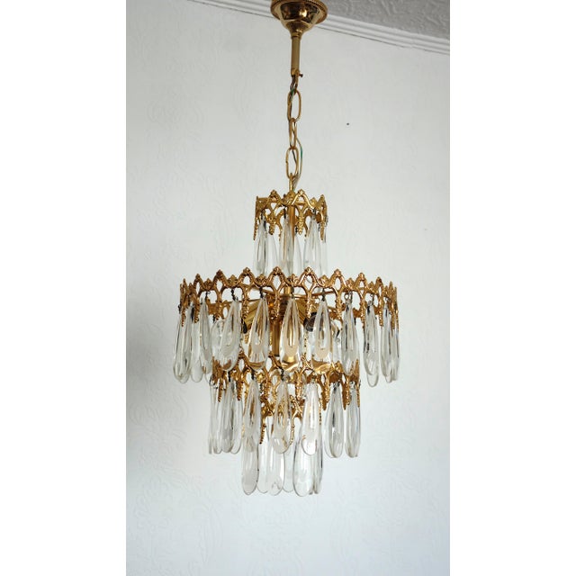 Drop Chandelier in Brass and Murano Glass, 1970s, in Very Good conditions. Designed 1970 to 1979 I have official proof of...
