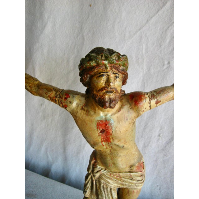 This Christ carved wood can be date from the 1700 hundreds in the Baroque Italian style , you what seems to be the...