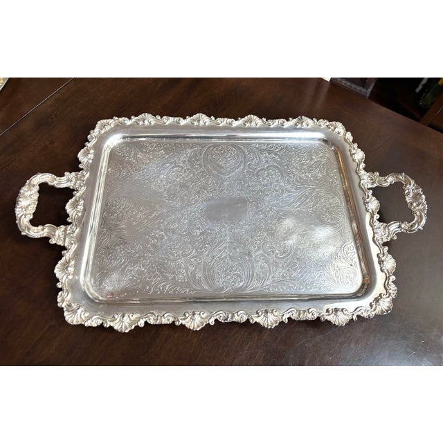 Beautiful SilverPlate, 27”x16”, shell and scroll design. Rectangular footed with handles. Hallmarks not identified. No...