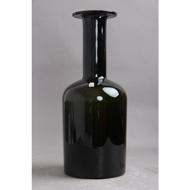 Green Glass Vase by Otto Brauer for Holmegaard Glasværk, 1960s, in Flawless conditions. Designed 1970 to 1979 This piece...