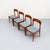 Set of four Danish dining chairs, designed by Henning Kjaernulf for Korup Stolefabrik in the 1960s. The chairs feature a...