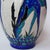 Biches bleues' an art deco, crackle glazed ceramic vase designed by charles catteau (1880-1966) for boch frères. A tapered...
