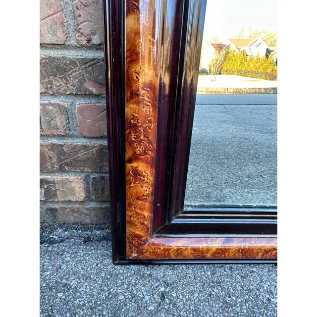 This is a stunning antique mirror! This piece has an ebonized outer and inner border which serves to accent the beautiful...