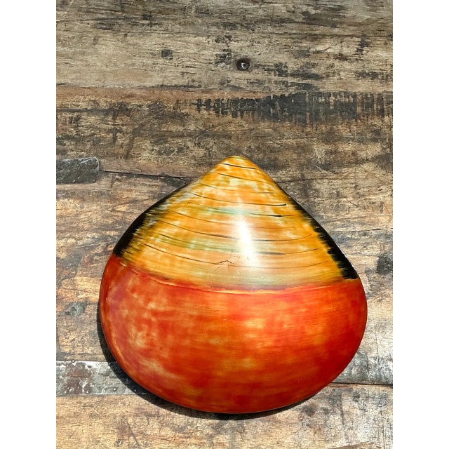 This vintage lacquered clam shell box brings bold color and organic shape to any vignette. Crafted from bamboo with a...
