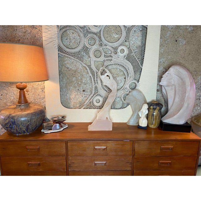 This Art Deco Dancing Lady Figurine out of Satin Lucite is larger than you would think and makes a great postmodern...