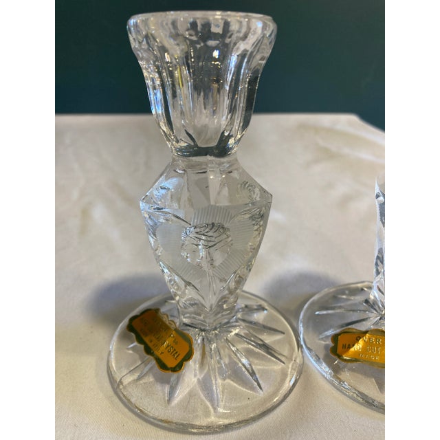 Beautiful set of leaded crystal candlesticks with hand cut roses. These candlesticks have never been used and will be...