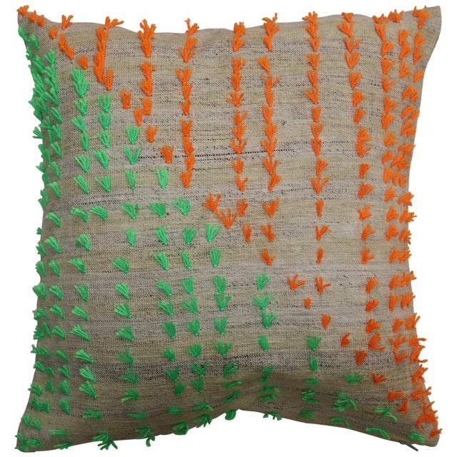 Pillow made from a vintage Turkish Kilim with colorful pops of wool stitched on giving it a bohemian vibe. Zipper closure...