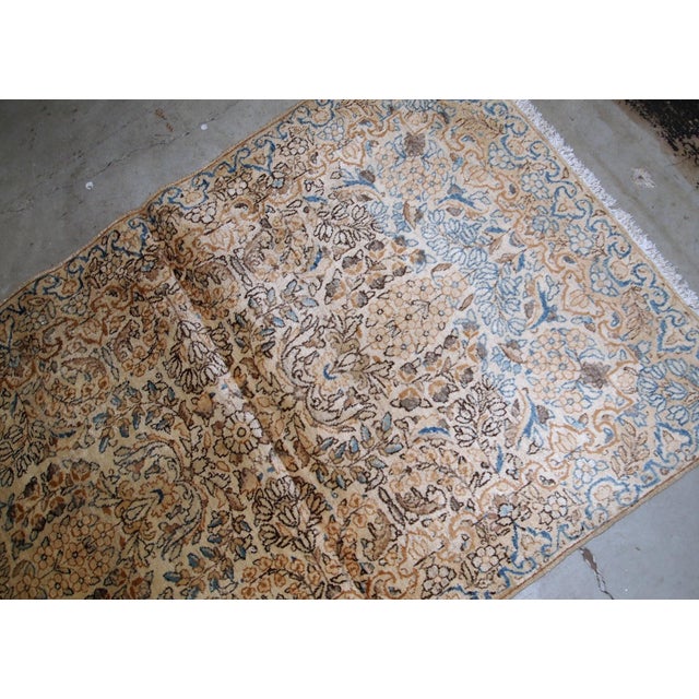 Handmade antique Kerman rug from the beginning of 20th century. The rug is in original good condition made in wool....