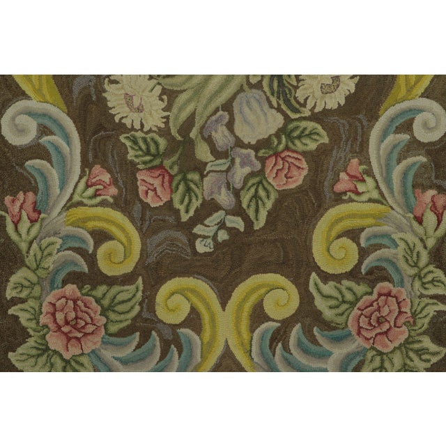 This 3x4 antique hooked rug is an exciting new addition to Rug & Kilim’s Antique collection; a striking folk-art...