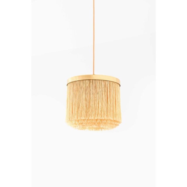 The t-605 ceiling lamp, designed by hans-agne jakobsson in 1965 and produced by his own firm in markaryd, sweden, is a...