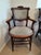 2 Chairs with arms. 6 side chairs. Padded seats and back. Renaissance revival style. Circa 1875.