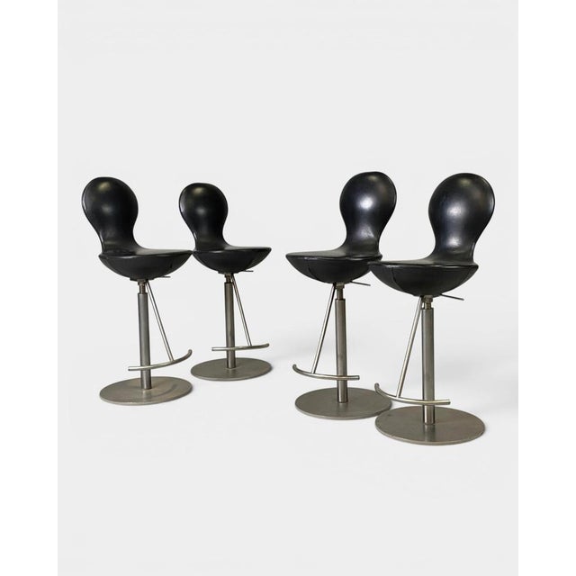 Set of 4 designer “Eight” bar stools designed by Olav Eldrøy for Varier Furniture. An iconic piece of Norwegian design...