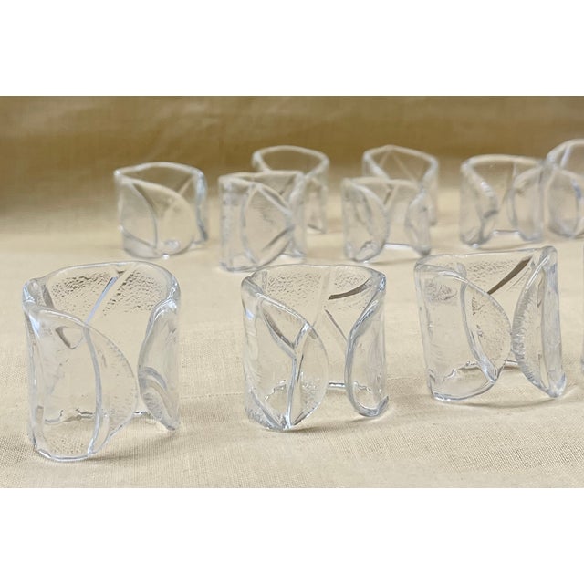 An exceptional and rare set of 12 Scandinavian Modern Art napkin rings from the famous "Ice Glass" era, attributed to...