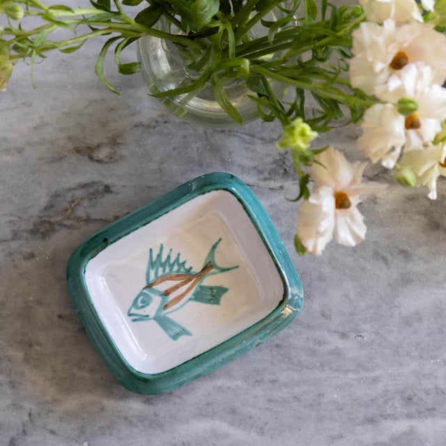 Beautiful painted ceramic dish by Robert Picault from France 1950s. Rectangular dish with painted fish and green painted...