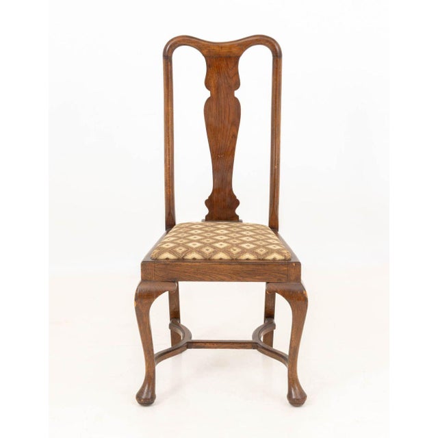 Set of Eight Queen Anne Style Walnut Dining Chairs, with fabric upholstered seats atop cabriole legs. 42.5" H x 20" W x...