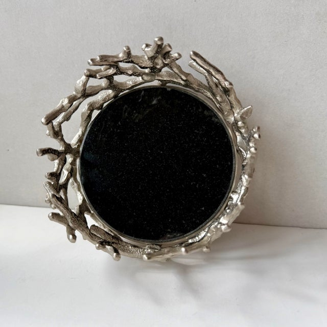 Michael Aram aluminum holloware wine bottle coaster from the Ocean Reef collection.