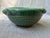 Vintage small green hand thrown glazed pottery bowl with small side handles. No marks. Bowl measures 6 3/4" by 5 3/4" by...