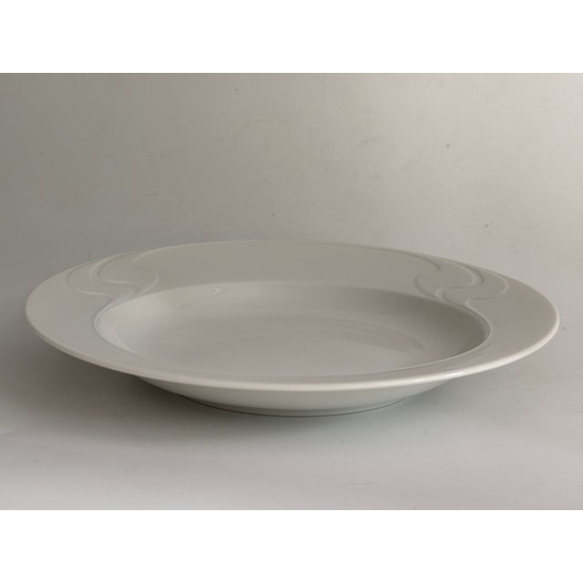 Item: Soup plate 22.5 cm Manufacturer: Rosenthal Series: Asimmetria Decoration: White Material: Porcelain Condition: Very...
