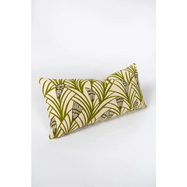 This lumbar pillow is a beautiful spring inspired piece with a hand printed green leaf pattern matched with a cream...